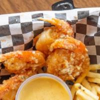 Crispy Fried Shrimp Combo · Crispy, hand breaded shrimp tossed in our signature sauce of your choice. Served with your c...