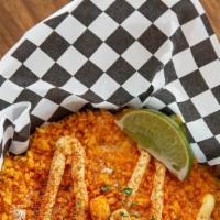 Cheddar Jalapeno Cheetos Elotes · Grilled corn topped with mayonnaise, cotija cheese, dusted with red chile powder and served ...