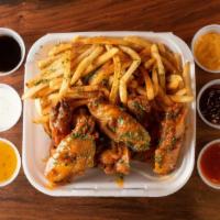 Crispy Chicken Wings Combo · Crispy chicken wings coated with sauce. six pieces.