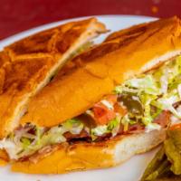 Tortas · With choice of meat, cheese, bean, lettuce, tomato, avocado, jalapeños, and crema. Served wi...