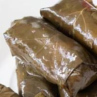 Dolma  · 6 pieces Stuffed grape leaves 
With pita bread