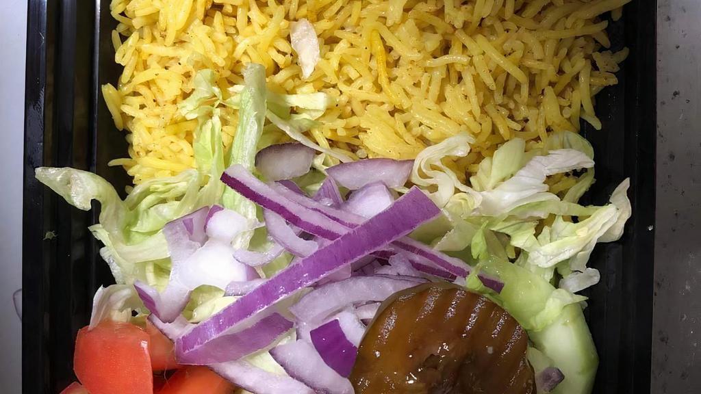Side Of Rice · Basmati rice with salad lettuce, tomato, cucumbers, red onion, pickles, tzatziki sauce, and hot sauce.