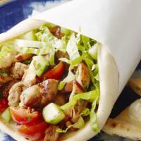 Chicken & Falafel · Marinated chicken thighs and falafel on pita bread with salad, lettuce, tomato, cucumbers, r...