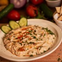 Babaganoush · Roasted eggplant puree blended with olive oil, herbs, tahini, yogurt, and garlic. Comes with...