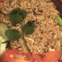 Curry Fried Rice · Egg, Green Onions, Tomatoes, Yellow Onions, Yellow Curry Powder. Light veggies, everything i...