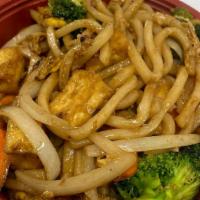 Udon See Ew · Thick udon noodles, egg, broccoli, carrots, yellow onions. Noodle and vegetable stir-fry.