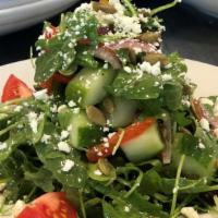 Greek Cucumber Salad · Mixture of arugula, red bell peppers, red onions, pumpkin seeds, cucumbers, kalamata olives,...