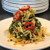 Jalapeño Coleslaw · Peanut dressing, Fresno peppers, cabbage, kale and cilantro, green onions