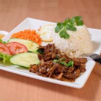 Grilled Pork White Rice · Honey Grilled Pork Glaze with steamed rice, lettuces , tomato, cucumbers, and pickle carrots...