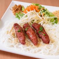 Grilled Pork Sausage Vermicelli · Grilled pork sausage  with vermicelli, shred lettuces , bean sprouts, , cucumbers, and pickl...