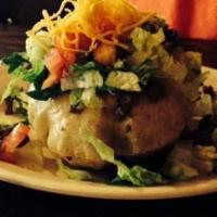 Enchiladas Espinacas · Two spinach and mushroom enchiladas topped with salsa verde and Monterrey Jack cheese served...