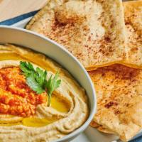 Hummus Plate  · With romesco sauce and fresh pita bread. Add gluten free bread for an additional charge.
