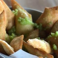Fresh Pita Chips  · Flavored with fennel oil, Parmesan, parsley, and citrus.