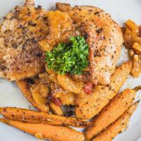 Roasted Chicken Thighs · With cherry apricot chipotle compote and side of carrots.