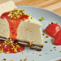 Cheesecake · Creamy, house-made cheesecake on a crust of whole Oreos, topped with our strawberry-basil sa...