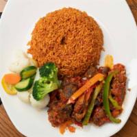 Asun Jollof (Entree) · Slow roasted marinated Goat Meat in Spicy Tomato Sauce served with a side of Jollof Rice and...