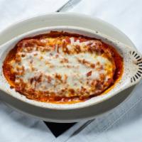 Lasagna · Pasta layered with beef and ricotta cheese topped with marinara sauce and mozzarella cheese....