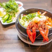 Pho Crawfish · Spicy. Crawfish, shrimp, scallops, lobster ball, calamari, vermicelli.