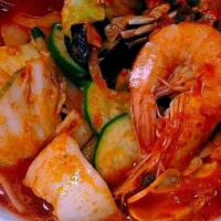 Spicy Seafood Noodle Soup · shrimp, squid, mussel, crab and variety vegetables with rice.