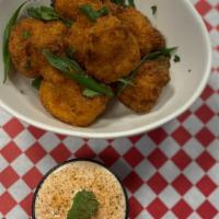 Certified Cauli-Wings  · Perfectly fried cauliflower breaded with Tobasco, sure to leave your mouth tingling with fla...