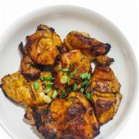 Chicken Inasal · Tender chicken marinated in a mixture of spices, citrus and lemongrass, then grilled to perf...