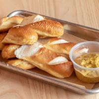 Soft Pretzels & House Mustard · 3 soft baked pretzels sliced and served with house stone-ground mustard
Contains: Gluten, Da...