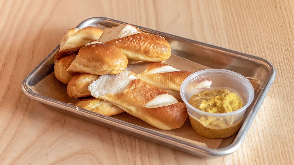 Soft Pretzels & House Mustard · 3 soft baked pretzels sliced and served with house stone-ground mustard
Contains: Gluten, Dairy