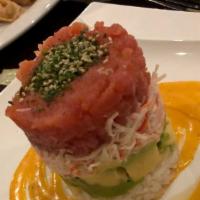 Sushi Towers · Crabmeat, avocado, rice, tobiko, masago. Spicy mayo and wasabi sauce.
