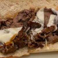 French Dip Sub Only · Roast beef, swiss cheese served with steaming au juu dipping sauce.