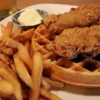 Fried Chicken & Waffles · Two crispy fried chicken tenders on top of a thick jumbo waffle. Served with your choice of ...