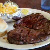 T-Bone Steak Dinner · Hearty 16oz. t-bone steak cooked to perfection. Served with baked potato and dinner roll.
