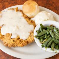 Chicken Fried Steak · Hand-breaded country fried steak, served with creamy gravy, any two sides or a baked potato ...