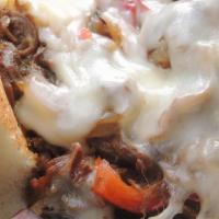 Guinness Cheesesteak · Guinness-braised ribeye, with caramelized peppers & onions, sauteed mushrooms, and Swiss che...