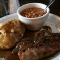 Bangers And Mash · Traditional English sausages, infused with beer and seasonings.  Served with mashed potatoes...