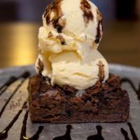 Chocolate Chip Brownie · A warm chocolate chip brownie topped with vanilla ice cream and drizzled with your choice of...
