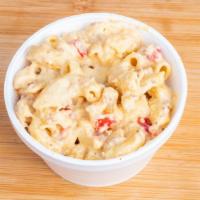 Sausage Mac & Cheese · The mac & cheese is extra cheesy today!