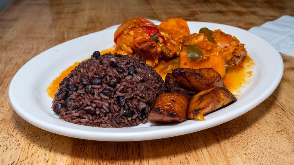 Fricase De Pollo · Served with fried plantains and your choice of black beans and rice mixed together or rice and beans served apart.