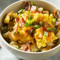 Breakfast Bowl · A hearty breakfast bowl filled with bacon, sausage, chorizo, ham, and potatoes. Topped with ...
