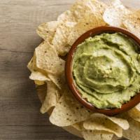 Chips & Guacamole · Jazz up your brunch with tasty tortilla chips and fresh made creamy guac.