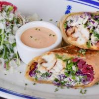Fish Tacos · Light & Crisp Coleslaw, Rolled In Our Special Wrap With Melted Cheese, Red Remoulade Sauce, ...