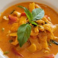 Red Curry · Spicy. Homemade red curry paste with coconut milk, bamboo shoots, bell peppers and basil lea...