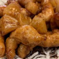Honey Chicken · Tempura-battered white meat chicken, tossed in our signature honey-seared garlic sauce. Serv...