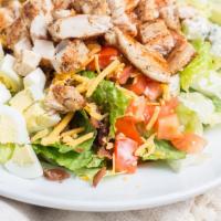 Cobb Salad · Lettuce mix, blue cheese dressing, blue cheese crumbles, tomatoes, eggs, bacon, chicken, avo...