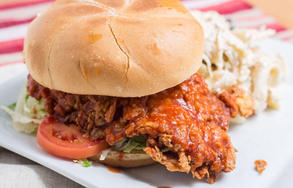 Buffalo Chicken Sandwich · Fried breaded chicken breast, lettuce, tomatoes, mayo, buffalo sauce. Served on a grilled kaiser roll.