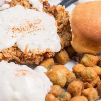 Chicken Fried Steak Dinner · Golden brown chicken fried steak topped with peppered gravy. Comes with roll and a choice of...