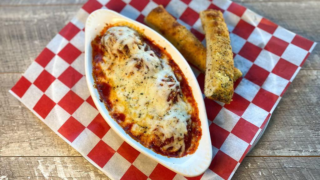 South Street Meatball Bake · Meatballs, homemade marinara and hand-grated mozzarella baked to a prized perfection, topped with Parry’s Parmesan mix and served with homemade breadsticks.