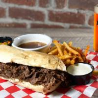 Hot Beef Dip · Fresh, thinly sliced steak served on an Italian roll, served with pickled giardiniera on the...