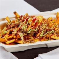 Loaded Plantain Fries · (Gluten Free) Made from scratch daily in our kitchen, our plantain fries are loaded with che...
