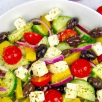Greek Salad · romaine lettuce, tomato,  black olives,(oregano and olive oil, lemon dressing), topped with ...