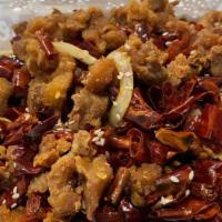 Dried Chili Chicken · Spicy. Spicy and addictive Chinese Chili Chicken tossed with sliced bell pepper, green chili...